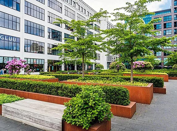 Office garden landscaping with green terrace and workplace greenery